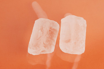 ice cubes on colorful background