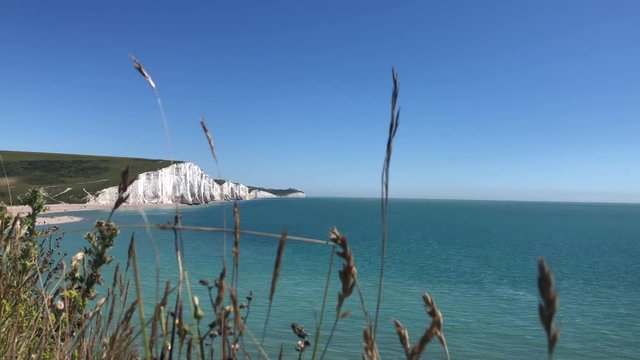 View of some white cliffs on the south coast of England on a bright sunny day.