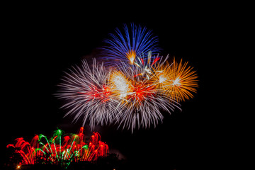 Fireworks in night sky.