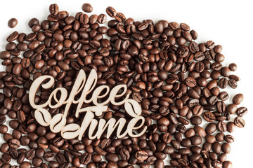 Coffee grains isolated on white background top view. Coffee time concept with the inscription