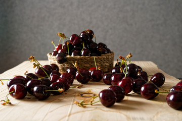 Ripe Catalonian cherries on wooden surface 