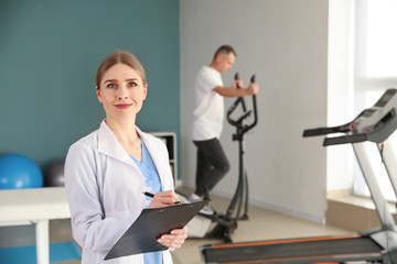 Female physiotherapist in rehabilitation center