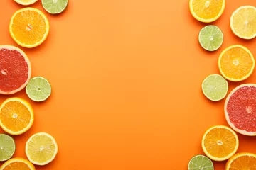 Foto auf Glas Many different citrus fruits on color background © Pixel-Shot