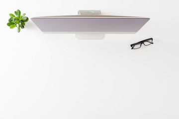 Elegant office desktop with computer and copyspace