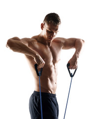 Strong, fit and sporty bodybuilder man over white background.