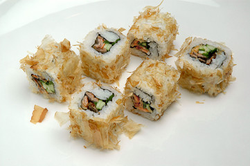 Sushi rolls on white background. Collection. Closeup of delicious japanese food with sushi roll.