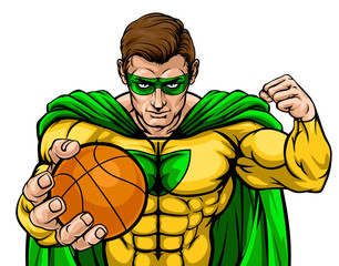 A superhero basketball sports mascot holding a ball © Christos Georghiou