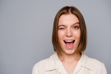 Close up photo beautiful amazing she her lady funny funky weekend vacation mood winking one eye ideal perfect appearance excited laugh laughter wear casual white shirt isolated grey background