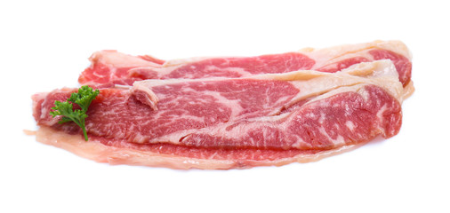 Fresh raw beef meat slices isolated over white background
