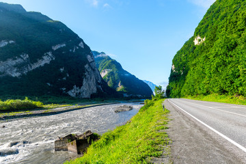 Mountain road along the river in the mountains of the Caucasus, Georgia © kosmos111