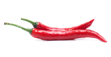 red and green chili pepper on white background