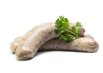 Raw sausage with coriander leaf isolated on white background