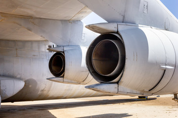Looking at the back side of a military jet's engines