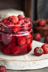 Strawberry jam in a glass jar