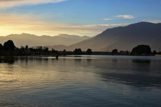 Shikara boats on Dal Lake with Sunset Dal Lake in Srinagar Jammu and Kashmir state India