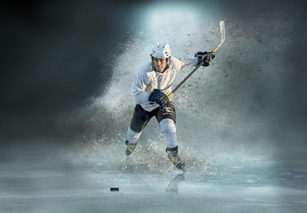 Caucassian ice hockey Players in dynamic action in a professiona