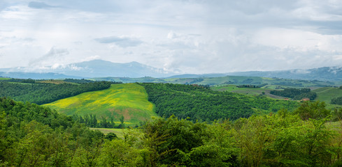 Beautifully illuminated landscape of Tuscany . green hills