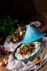 Tajin beef stew with rice paprika and sesame seeds