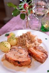Schnitze with Kartoffelsalat and Sauerkraut. Weingut Holzapfel;Vienna;Austria