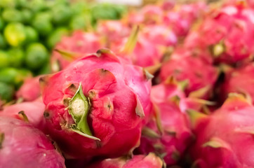 Fototapeta premium group of pitaya fruit at traditional marketplace
