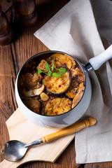 Veal goulash with baked aubergine and herbs
