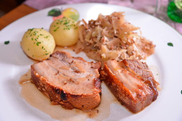 Schnitze with Kartoffelsalat and Sauerkraut. Weingut Holzapfel;Vienna;Austria