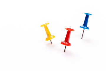 Push pins isolated on white background.
