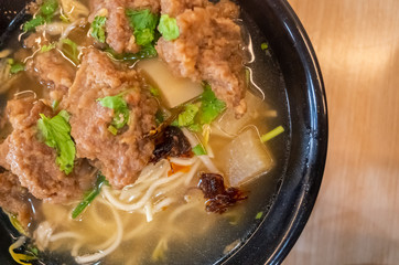 Taiwanese food of soup noodles with pork ribs cakes