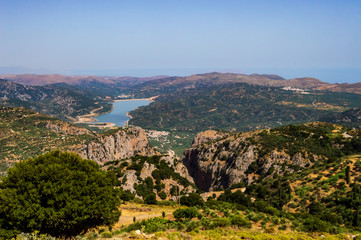 Fototapeta na wymiar View of the lake Sfendili in the center of the island o