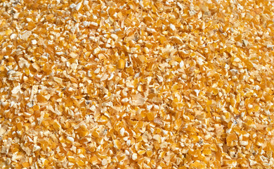 Background texture of crushed seed and grain mix for livestock and bird feed