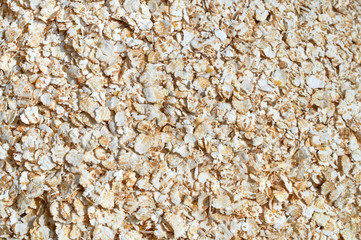 Background texture of crushed seed and grain mix for livestock and bird feed
