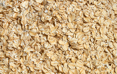 Background texture of crushed seed and grain mix for livestock and bird feed