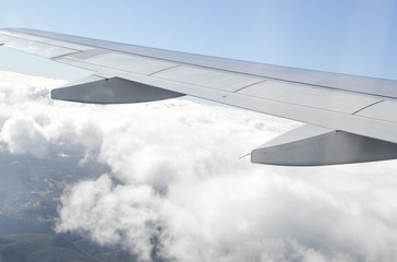 Fototapeta na wymiar above the clouds, clouds, airplane wing