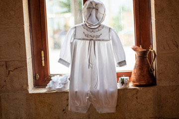 This is a Capture of a Baptism celebrated in Lebanon and you can see the white and gold color theme in the picture