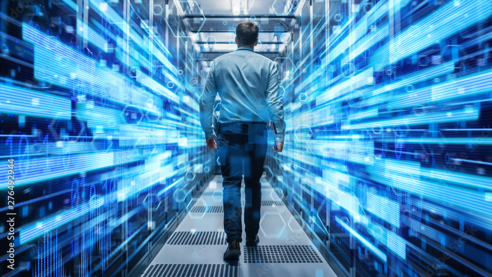 Fototapete Shot of a Young It Specialist Walking through Corridor in Working Data Center Full of Rack Servers and Supercomputers. Conceptual Visualisation of High Speed Internet Connection with Digits and Lines.