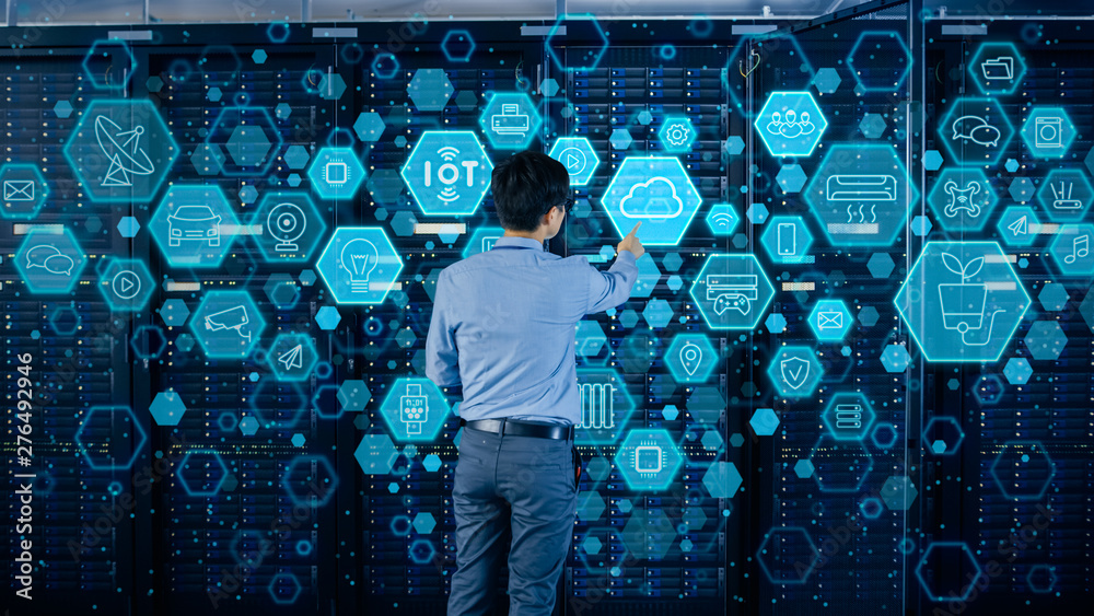 Aufkleber Concept of Cloud Data Storage. Shot In the Modern Data Center: IT Engineer Standing Beside Open Server Rack Cabinet and Touching Digital Illustrative Icons with Different Symbols and Visualisations.