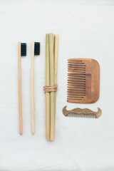 bamboo brushes, straws, wooden and metal brushes, eco bag.