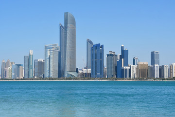 Fototapeta na wymiar ABU DHABI, UAE. Abu Dhabi skyscrapers in sunny day 