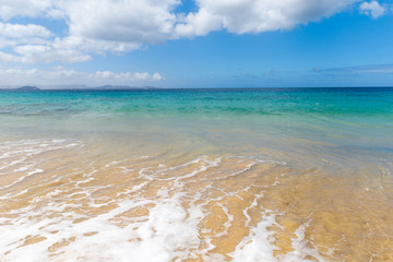 Panorama of beautiful beach and tropical sea of Lanzarote. Canaries