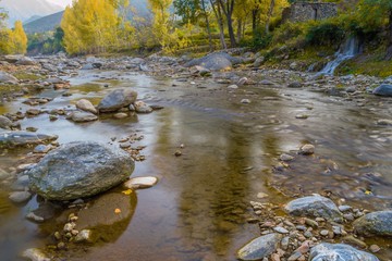 Autumn trees reflections in a lake