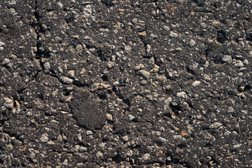 Macro texture of old cracked asphalt