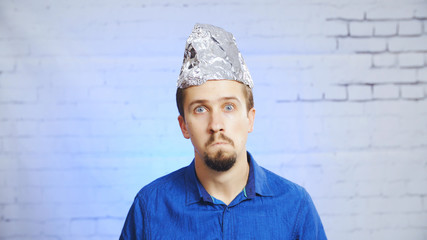 Stupid man with a conspiracy foil hat