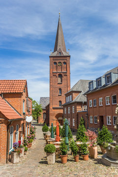 Market square and church tower in Plon, Germany