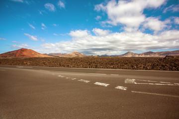 Fototapeta na wymiar Big empty road in a mountains