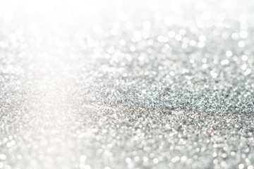 Silver sparkle glitter abstract bokeh background Christmas