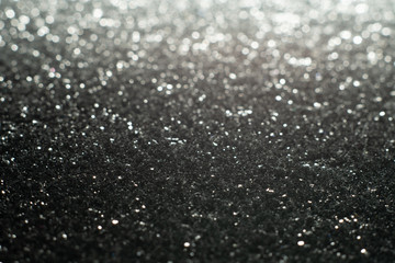 Silver sparkle glitter abstract bokeh background Christmas