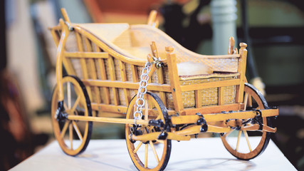 Fototapeta premium Miniature carriage close-up