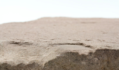 Fototapeta na wymiar Sandstone front Empty space blurred on white background. .