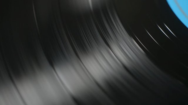 Vinyl is spinning on a turntable.