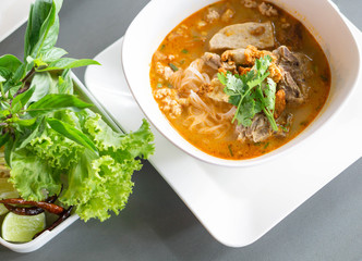 Rice noodle soup with Cooked Liver in  bowl on table, selective focus